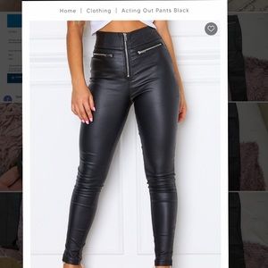 Black pants with zipper accents